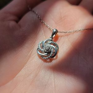 Diamond & Sterling Silver 0.02CTW Love Knot Pendant